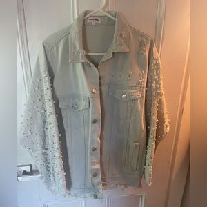 Jean jacket with pearls.